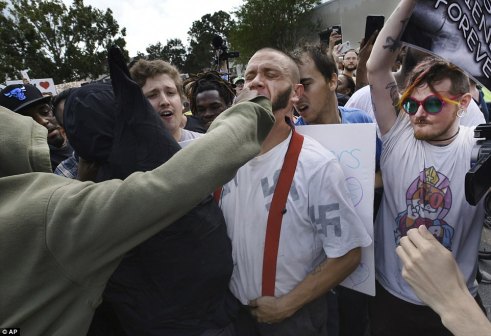4581553E00000578-0-Moments_later_another_unidentified_protester_punched_Furniss_in_-a-34_1508463892575